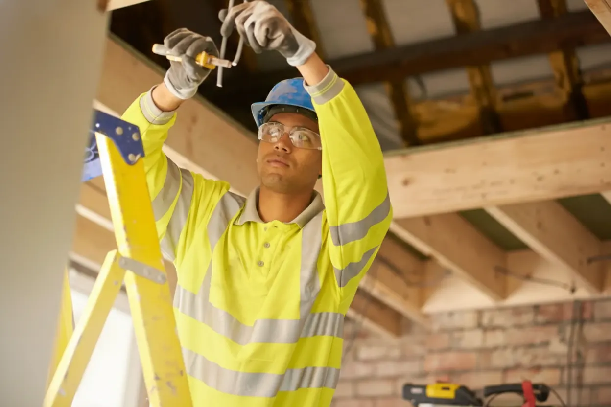 Electrician working on a panel