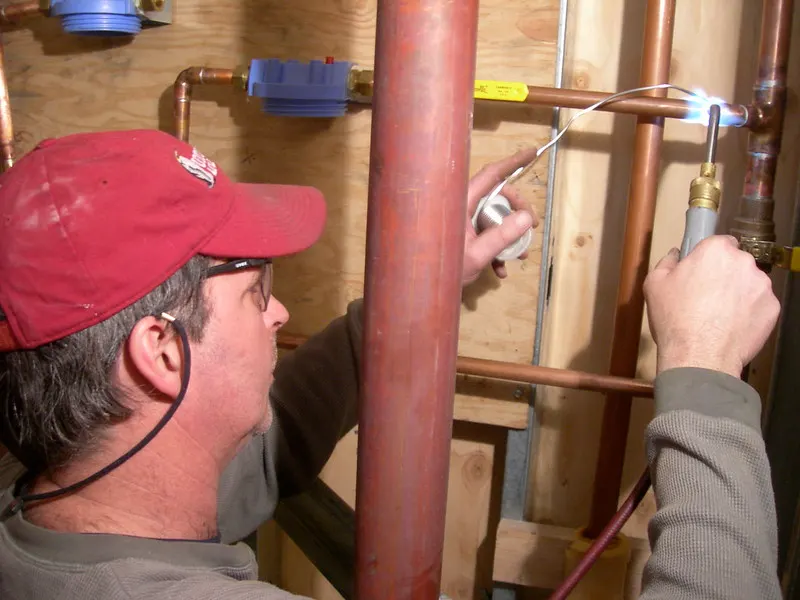 Professional Plumber at work